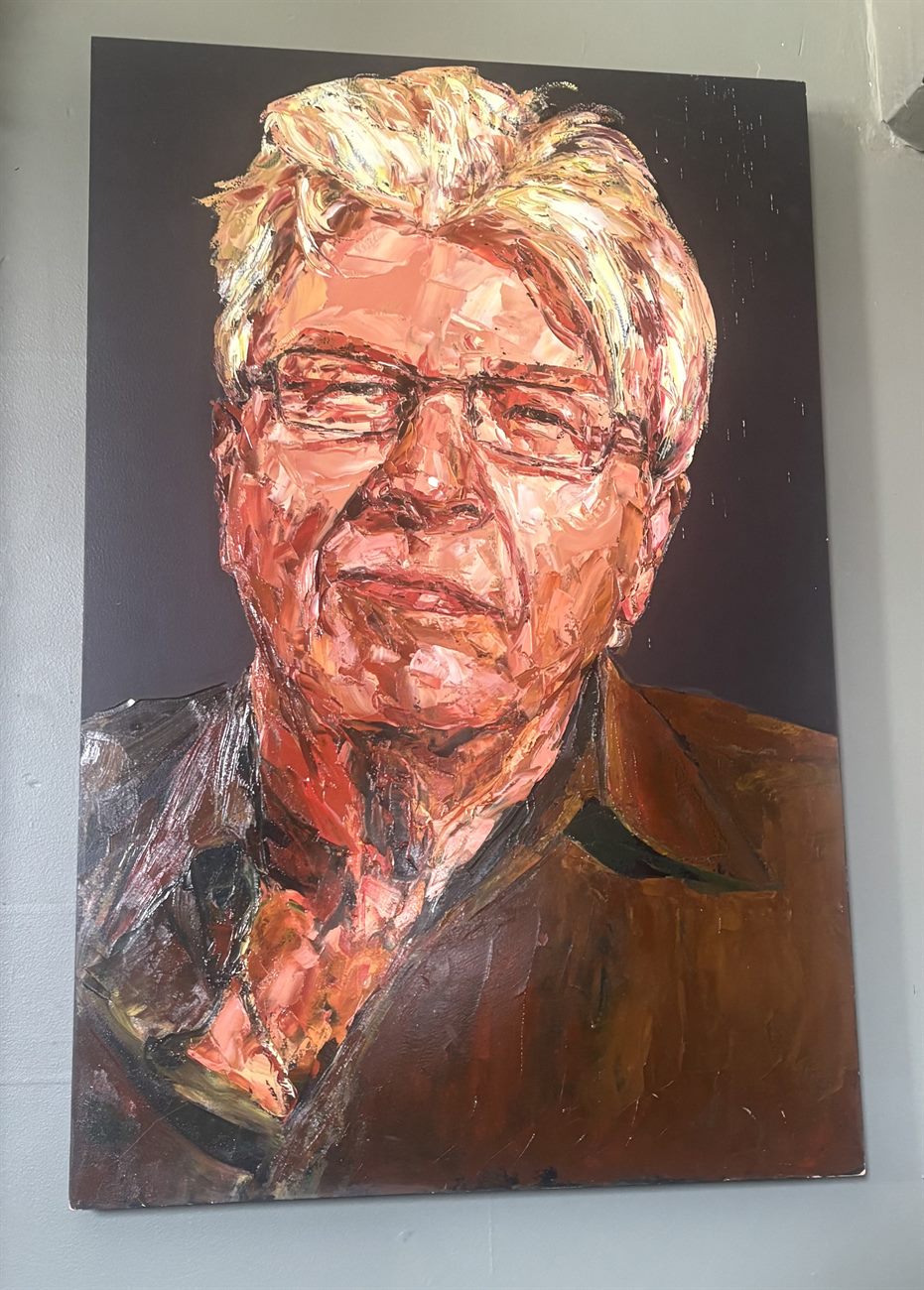 A painted portrait of Andrew Farran by artist Ron Penrose