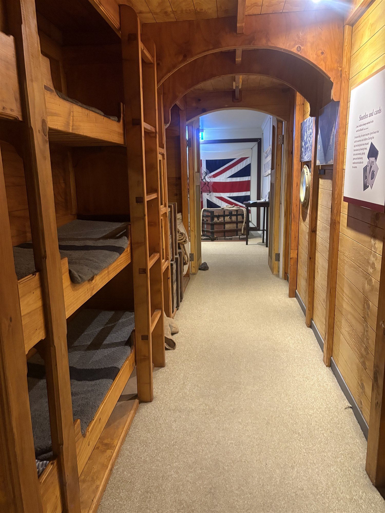 Inside the boat room, the immersive recreation of the ship's hold with timber bunks